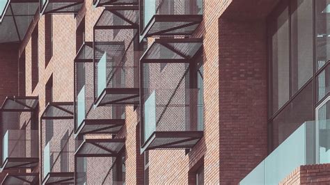 Download wallpaper 1920x1080 balconies, building, facade, bricks ...