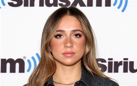 Tate McRae "got bored writing sad songs and being depressing"