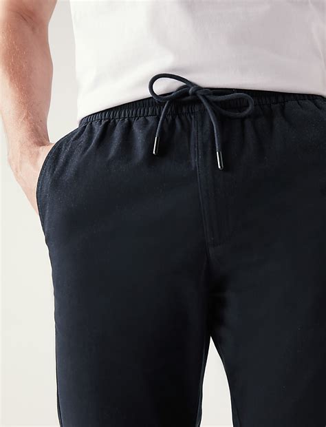 Buy Tapered Fit Elasticated Waist Trousers at Marks & Spencer
