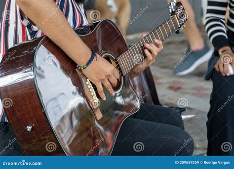 Latina Woman Playing Guitar in the Street, Young Brunette Woman, Latin ...