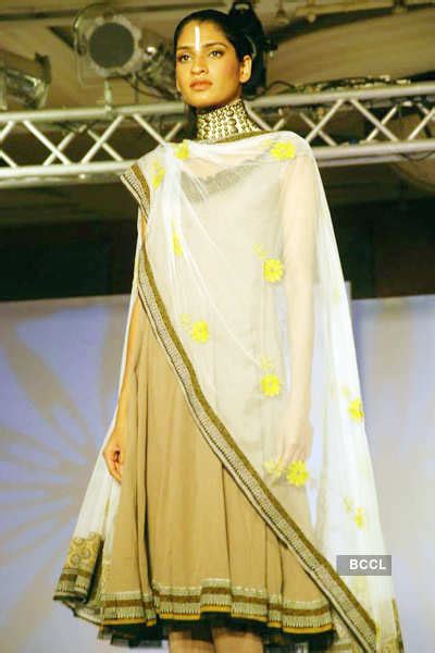 A model walks the ramp in designer Rina Dhaka's creation during Cotton ...