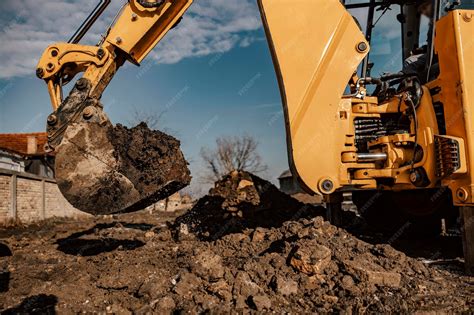 Image result for Backhoe Digging Hole