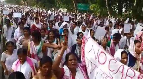 C(A)A Row: Tinsukia's ‘Panitula Namghar’ Members Stage Protest wearing ...