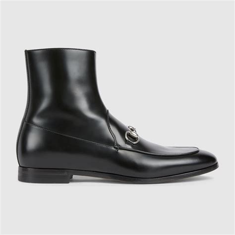 Men's ankle boot with Horsebit in black shiny leather | GUCCI® RO