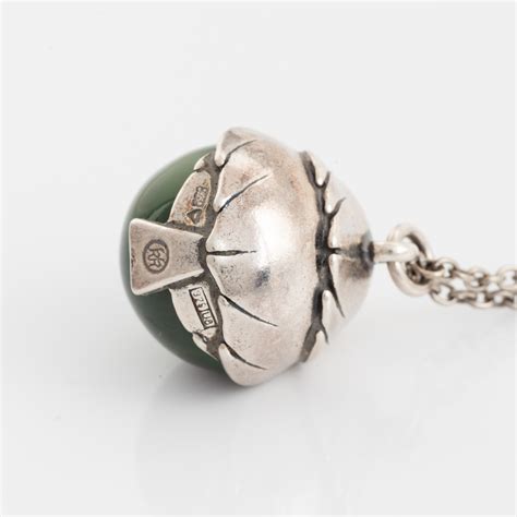 Kalevala Koru hängsmycke silver med grön sten. - Bukowskis