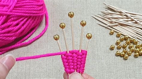 Image result for Small Flower Using Thread and Hand