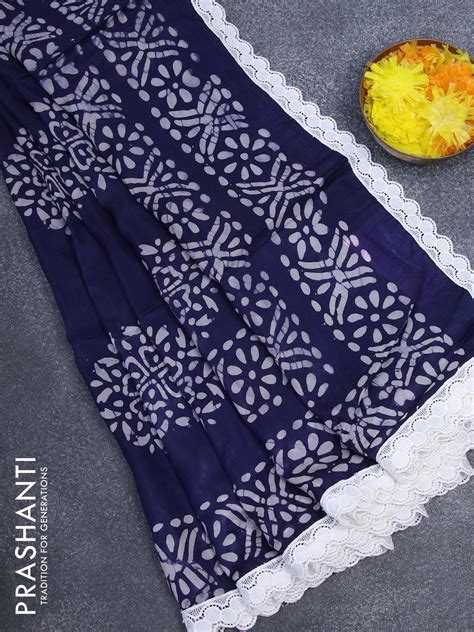 Organza saree blue with allover batik prints and crocia lace work bord ...