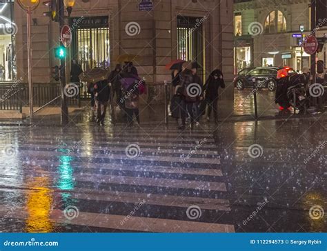People Cross the Street in the Pouring Rain. Editorial Stock Photo ...