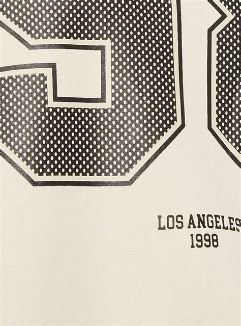 Buy Women Printed Boxy Fit Sports T-shirt Online at just Rs. 999.0 ...