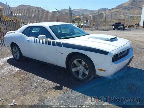 Report 2C3CDYBT9EH251274 DODGE CHALLENGER 2014 White Gasoline - price and damage history