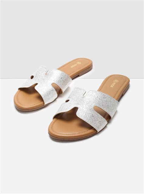 Buy Women Textured Slip-On Flat Sandals Online at just Rs. 549.0 ...