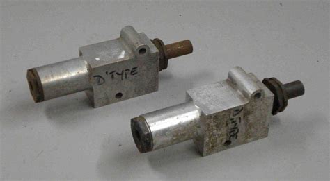 Bonhams Cars : Two Jaguar brake master cylinders,