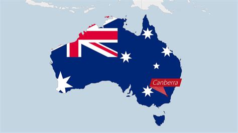 Australia map highlighted in Australia flag colors and pin of country capital Canberra. 22223077 ...