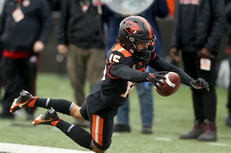 Oregon State’s Luke Musgrave does it all on a punt block for a ...