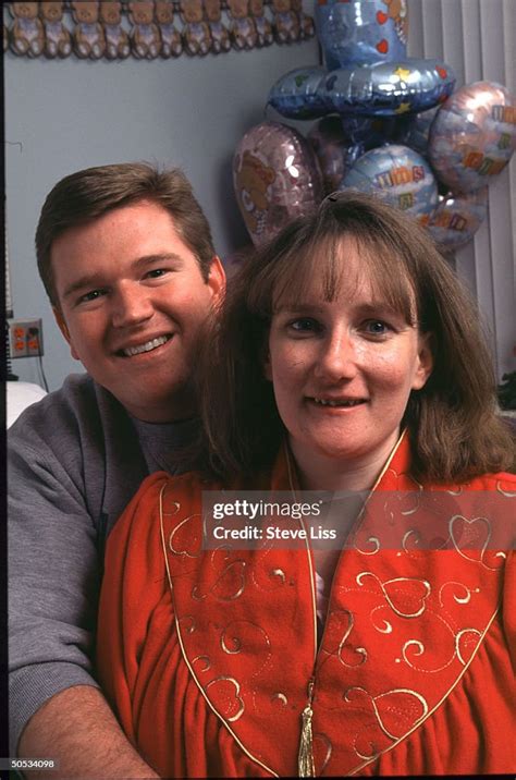 Kenny McCaughey hugging wife Bobbi McCaughey in her hospital room ...