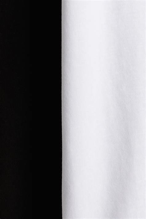 2-pack oversized T-shirts - Black/White - Kids | H&M IN