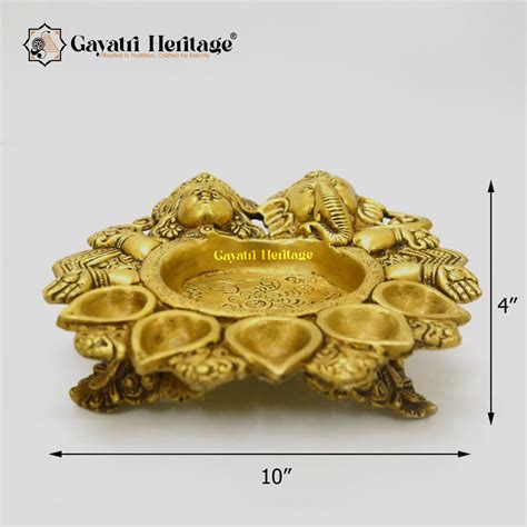 Brass Ganesh Laxmi Diya – Illuminating Wealth and Wisdom | Gayatri Her ...