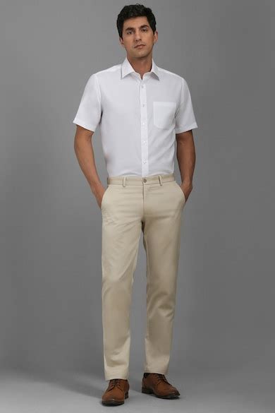Buy Men Beige Slim Fit Solid Flat Front Formal Trousers Online ...