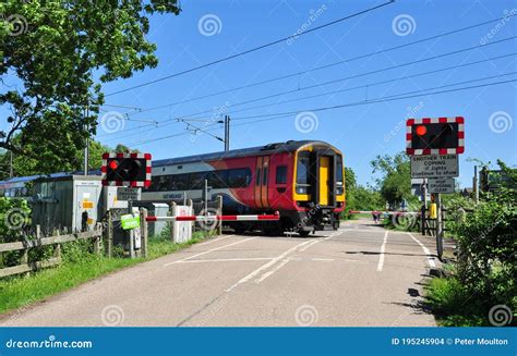 Train & Level Crossing editorial stock image. Image of passes - 195245904