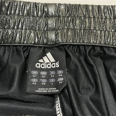 adidas コーティングデザイン トラックパンツ アディダス | BANCA