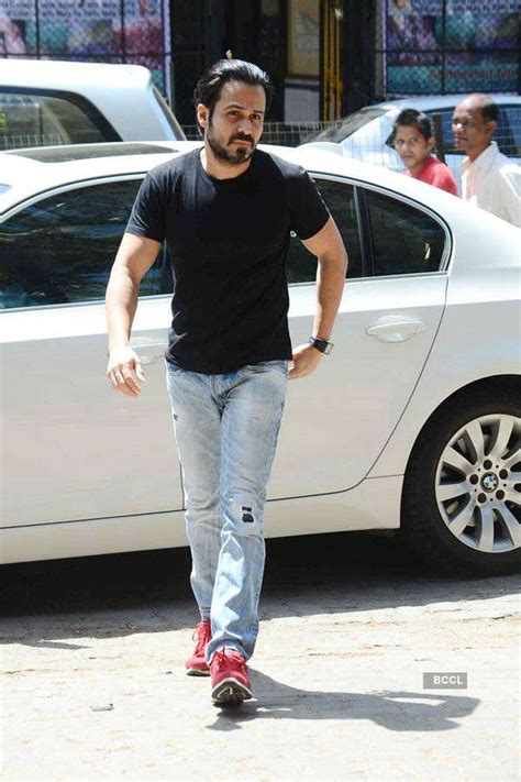 Mahesh Bhatt with a guest during Emraan Hashmi’s mother's funeral in ...