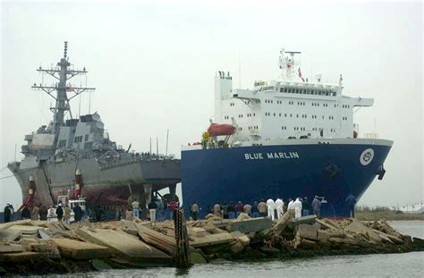 USS Cole Escorted into U.S. Port since Oct. 12, 2000 Attack