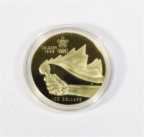 #1 GOLD $100 DOLLAR COIN 13.3 GRAMS CALGARY 1988