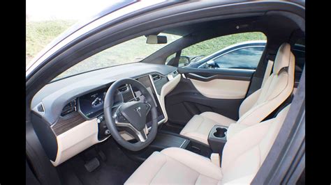 White Tesla Suv Red Interior | Two Birds Home