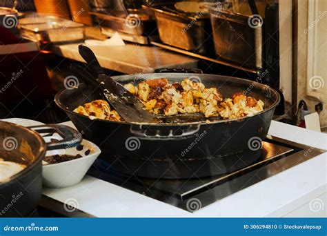 Open Kitchen of Restaurant or Cafe in Vienna, Europe. Big Black Frying ...