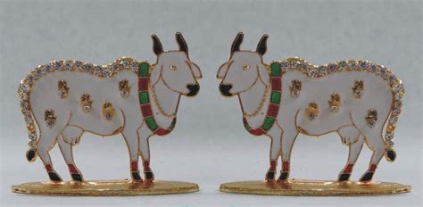 Buy Radha Arya Laddu Gopal Toy Pieces of 2 Toys Metallic Kamdhenu Cow ...