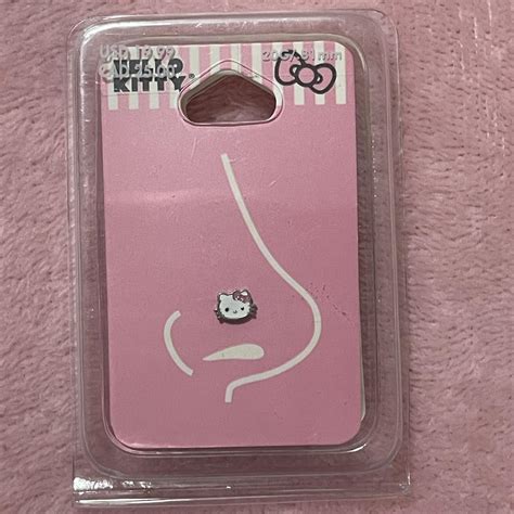 Hello kitty nose piercing, 0.81 mm, stainless steal,... - Depop