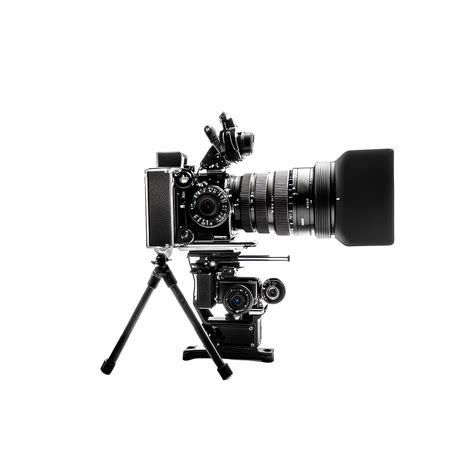 Professional film camera on a tripod positioned against a clean ...