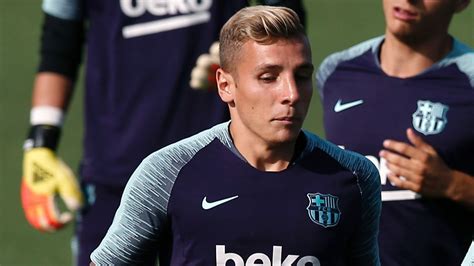 Barcelona's Lucas Digne returns to Spain to finalise Everton move ...