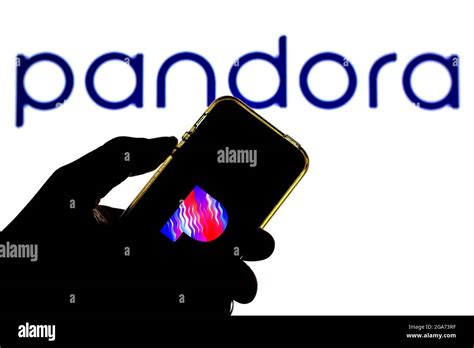In this photo illustration a Pandora Radio logo seen displayed on a ...