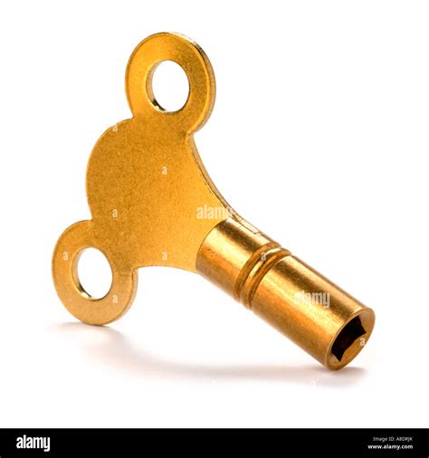 Clockwork wind up key Stock Photo - Alamy
