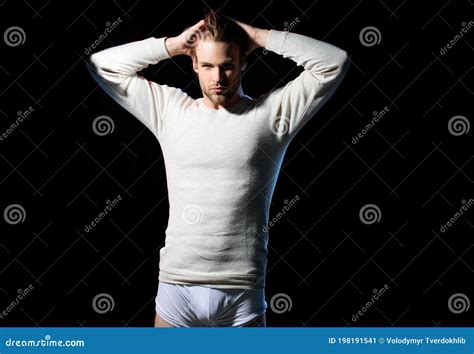Man in Boxer Shorts Shows His Underwear. Muscular Young Man in White ...