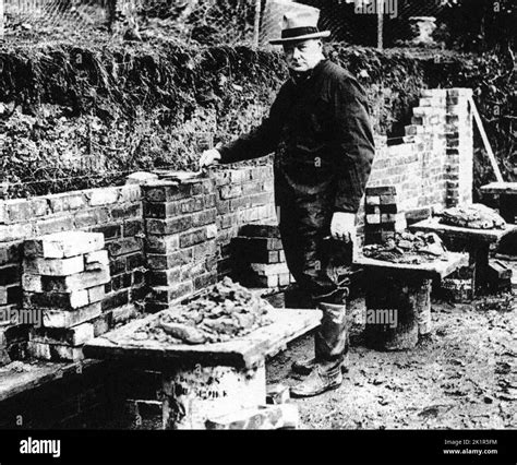 Winston Churchill bricklaying a wall at Chartwell 1928 Stock Photo - Alamy