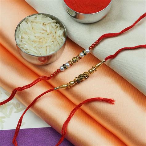 Send Designer Pearl Set of 2 Rakhis Online | Rakhibazaar.com