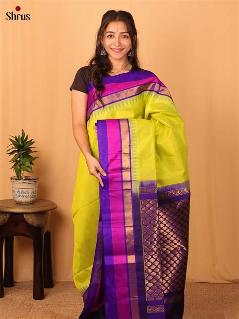 Green Silk Cotton Saree With Plain Body And Contrast Violet Zari Woven