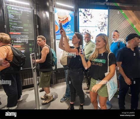 Throngs of hungry burger lovers and thirsty beer drinkers flock to the ...