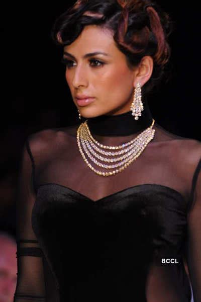 A model walks the ramp to showcase CVM exports jewellery collection ...