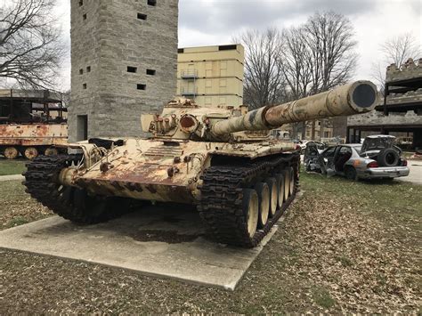 Iraqi T-72M Tank in Front of a Tall Building