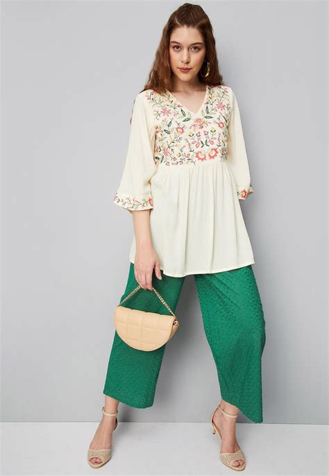 Buy Women Embroidered Flared Sleeve Tunic Online at just Rs. 899.0 ...