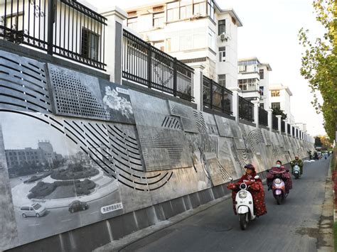 扬州江阳路120米浮雕墙震撼亮相 讲述城市发展和变迁_江苏国际在线
