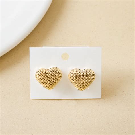 Earrings Online - Premium Net Textured Gold Heart Studs | Nestasia