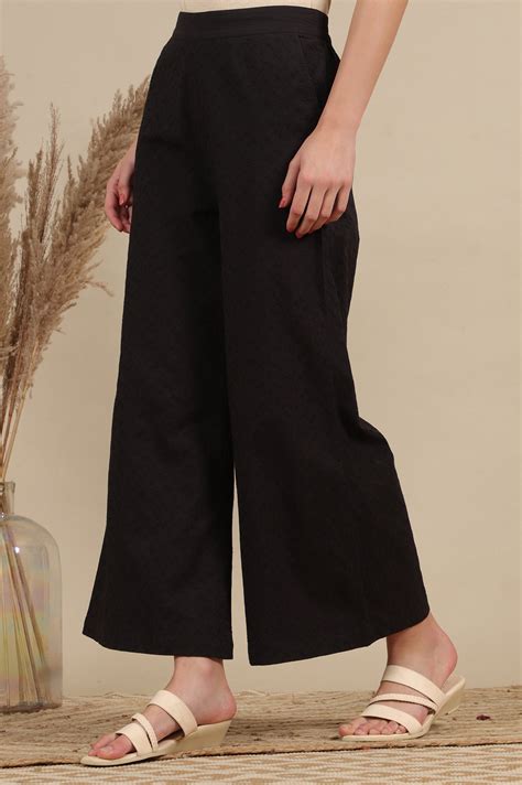 Buy Black Schiffli Embroidered Pure Cotton Flared Palazzo Pants Online ...