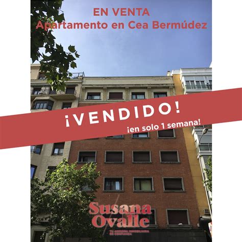 House Sold - Real Estate Sign on Building