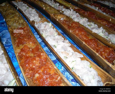 Traditional polynesian food, poisson cru (marinated raw fish), served ...