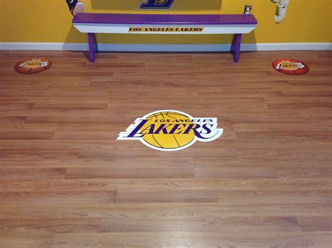 Los Angeles Lakers Logo on Hardwood Floor