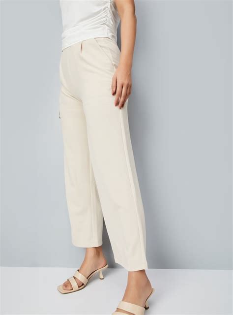 Buy Women Solid Wide-Leg Trousers Online at just Rs. 1199.0 ...